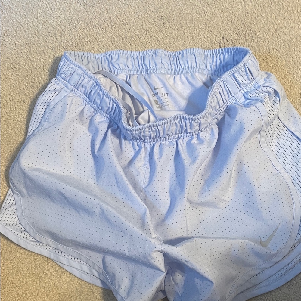 Nike Perforated Athletic Shorts in Light Blue